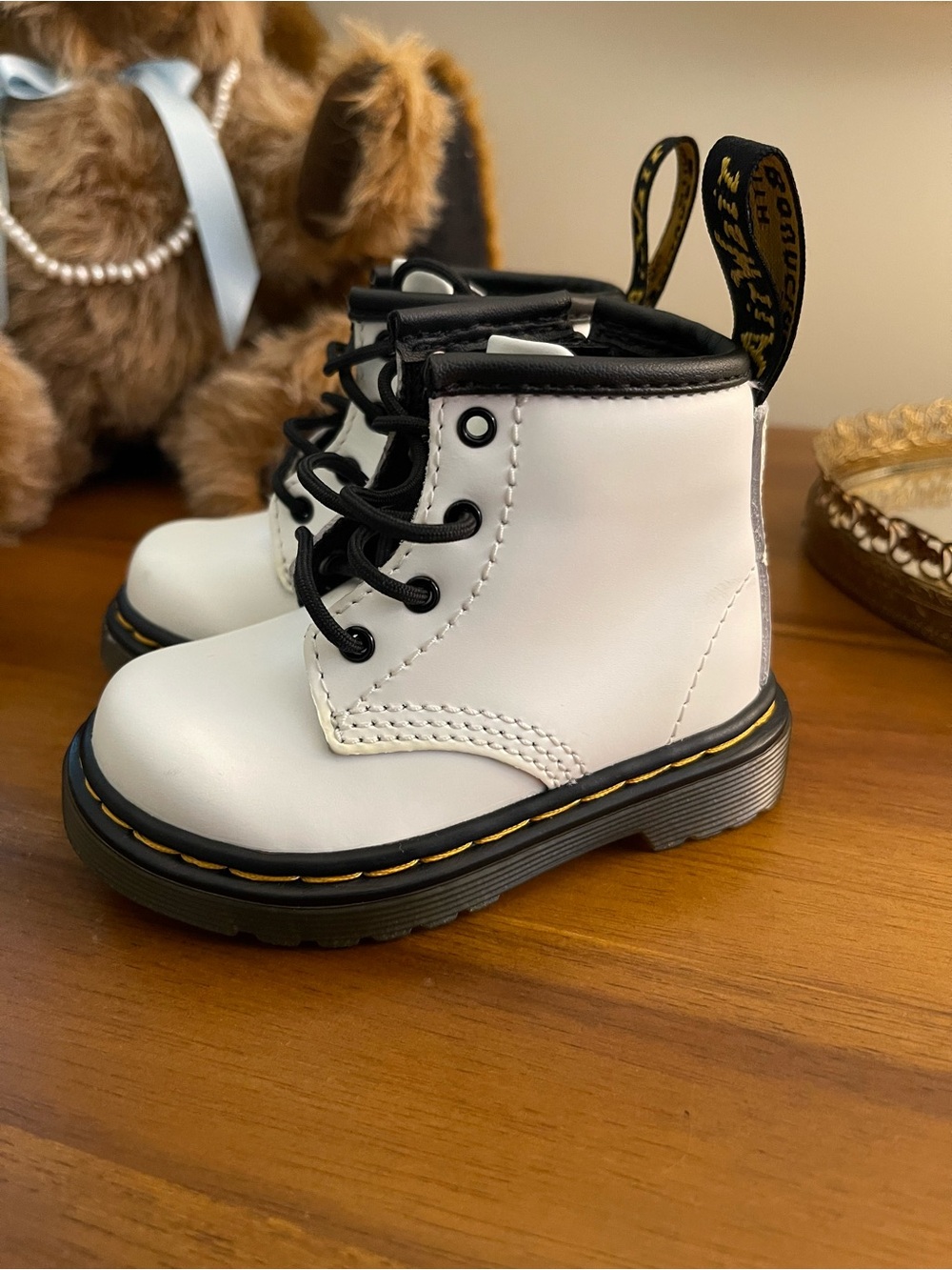 Dr. Martens White Kids Lace-Up Boots with Black Trim